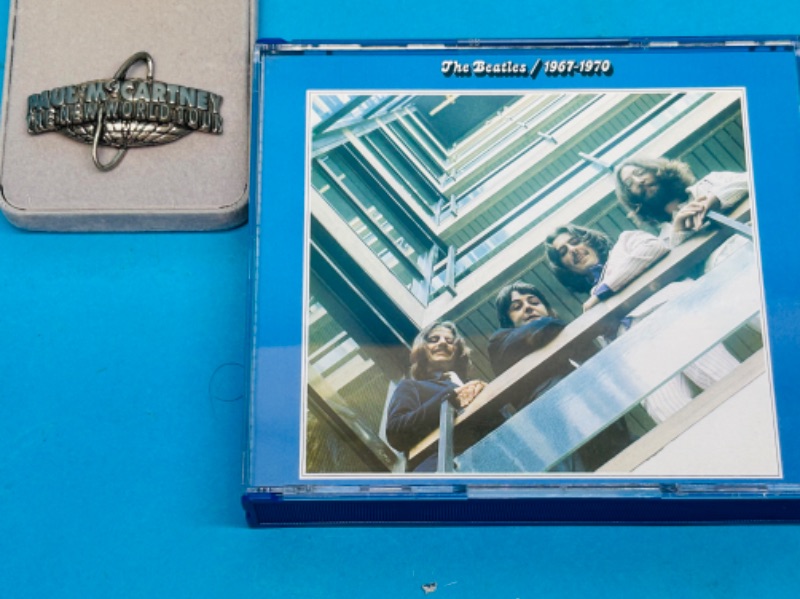 Photo 1 of 698790…Beatles Paul McCartney pewter world tour pin and music CD’s