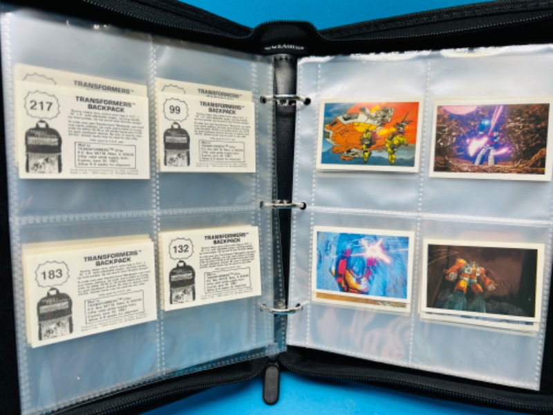 Photo 11 of 698810…74 vintage 1986 Transformers backpack stickers in binder - a few doubles 