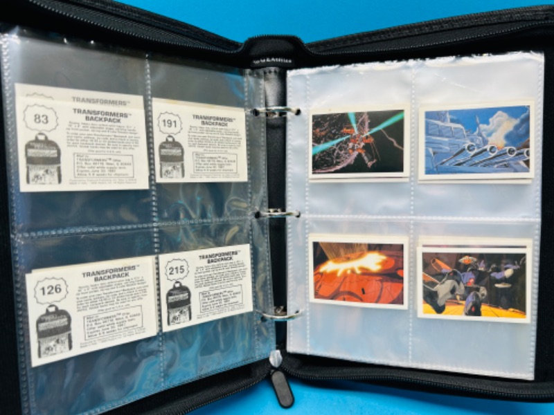 Photo 4 of 698810…74 vintage 1986 Transformers backpack stickers in binder - a few doubles 