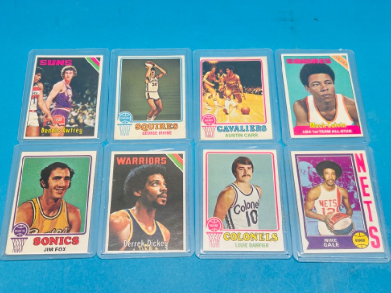 Photo 1 of 698818… 8 vintage basketball cards from the mid 1970’s in hard plastic sleeves 