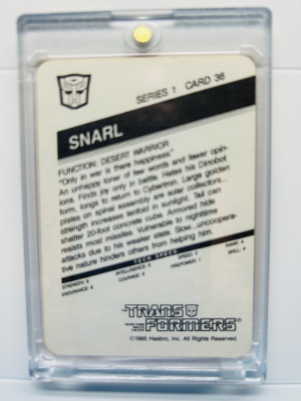 Photo 2 of 698822…vintage 1985 transformers series 1 Snarl card 36  in hard plastic case 