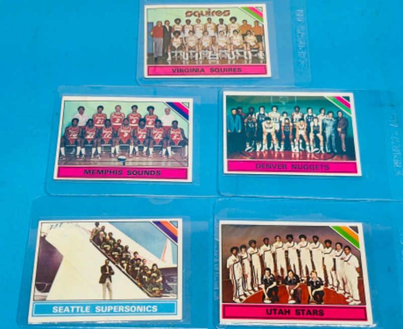 Photo 1 of 698825…5 vintage hockey team cards from the mid 1970’s in hard plastic sleeves 