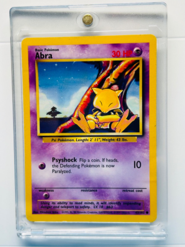 Photo 1 of 698833…Pokémon Abra card 43/102 in hard plastic case 