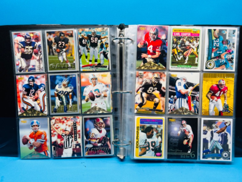 Photo 13 of 698869…306 mixed football trading cards in binder 