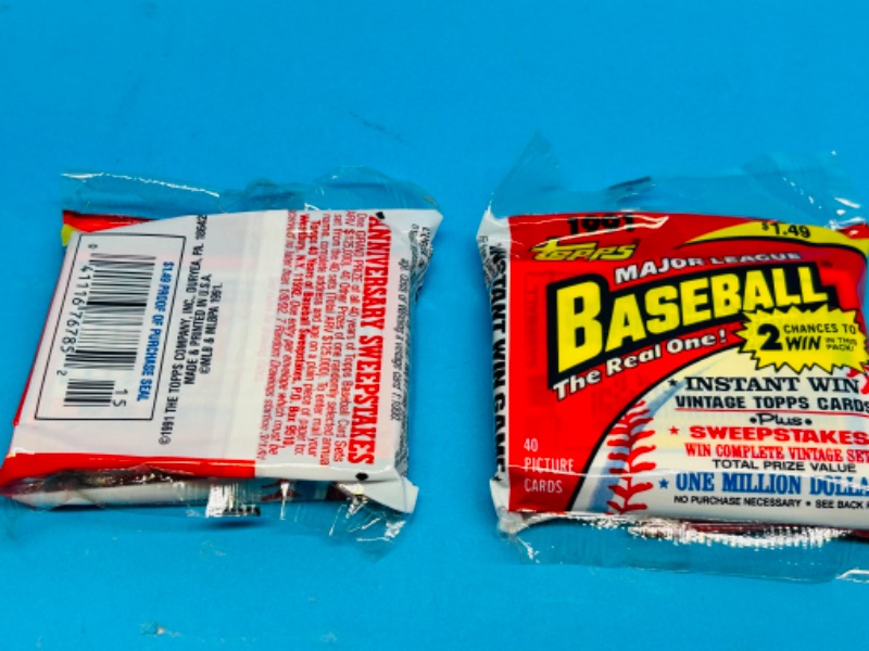 Photo 1 of 698894… 2 sealed Topps 1991 baseball the real one packs-40 cards per pack