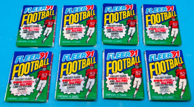 Photo 1 of 698895…8 sealed Fleer 1991 football card wax packs -14 cards per pack