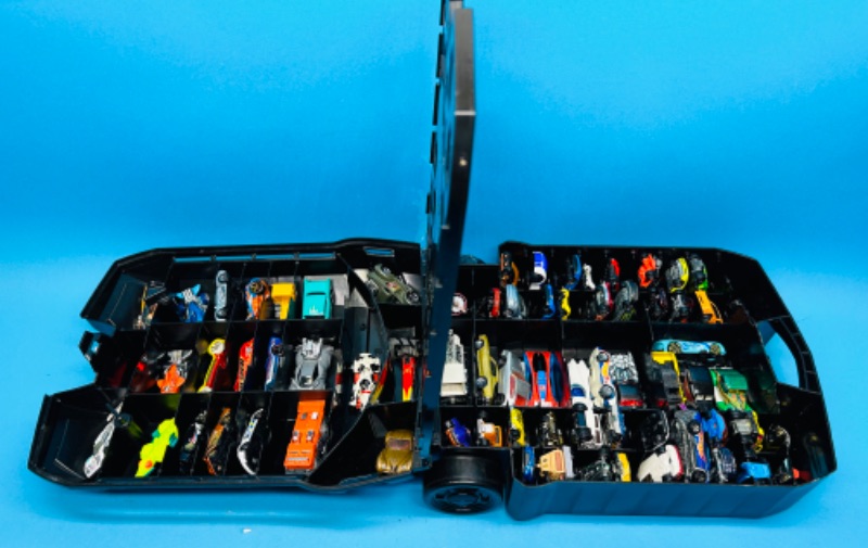 Photo 1 of 698925…70 die cast cars in hot wheels rolling case