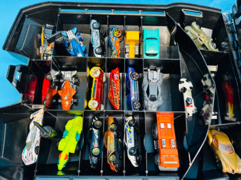 Photo 1 of 698925…70 die cast cars in hot wheels rolling case