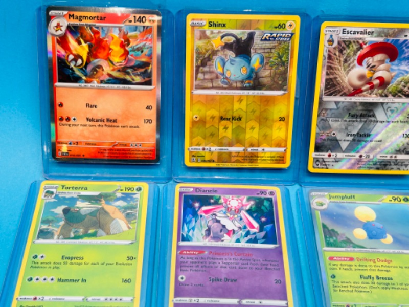 Photo 2 of 698941… 8 holo and reverse holo Pokémon cards in hard plastic sleeves 