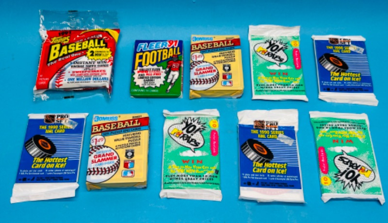 Photo 1 of 698944…10 sealed sports card packs