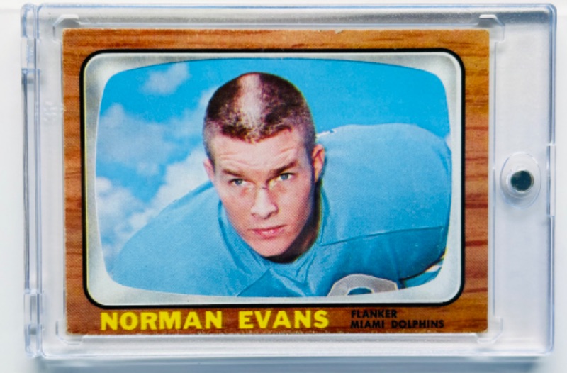 Photo 1 of 698946…Norman Evans 1966 Rookie card 77 in hard plastic case -corners show wear from age