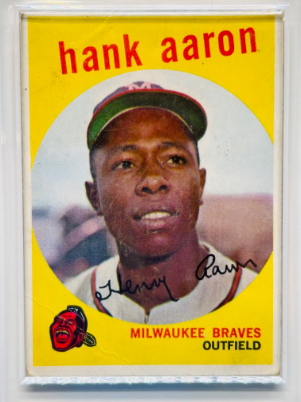 Photo 1 of 698947…1959 Hank Aaron card 380  in hard plastic case - shows swear from age