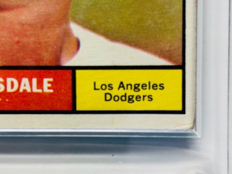 Photo 2 of 698948…1961 Don Drysdale card 260  in hard plastic case -wear from age