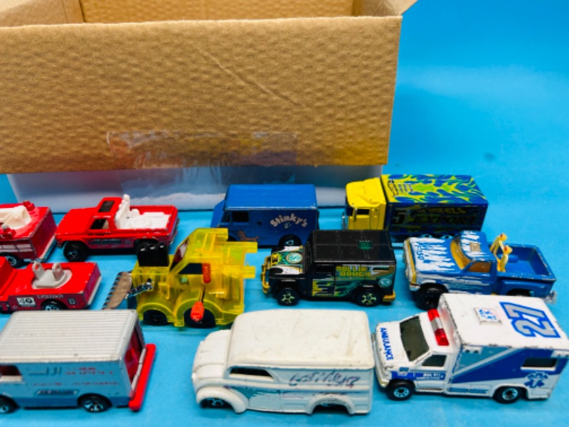 Photo 2 of 698964…major damage-29 die cast trucks with wear, chips, scuffs, missing  tires-see photos 