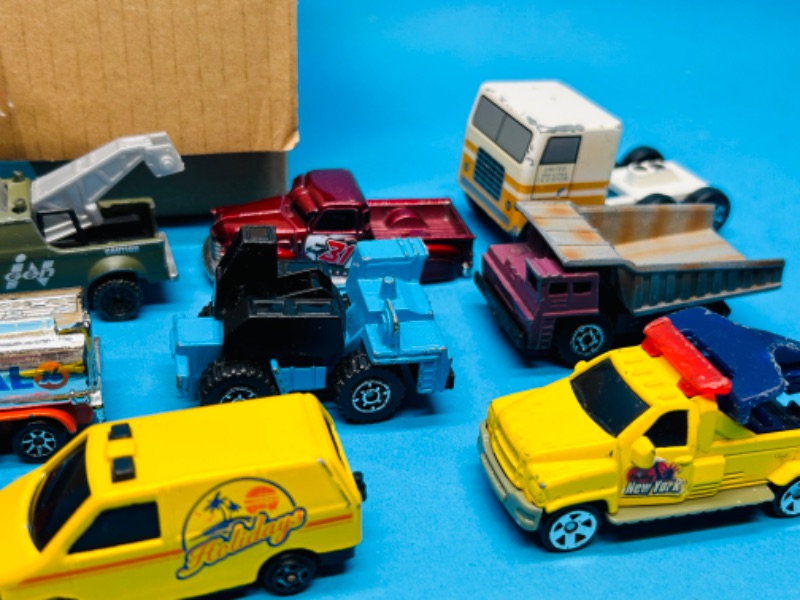 Photo 2 of 698966…minor damage- 28 die cast trucks with some wear -see photos 