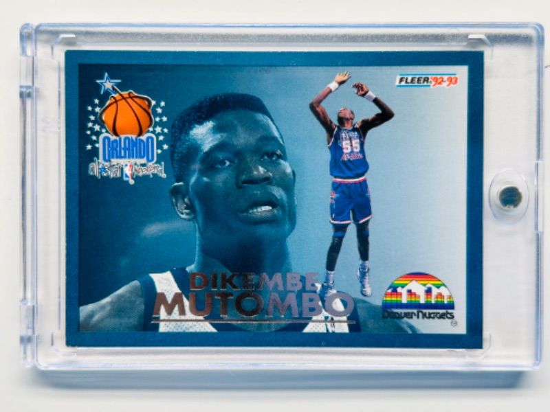 Photo 1 of 699006…Fleer Dikembe Mutombo Orlando card 19 in hard plastic case