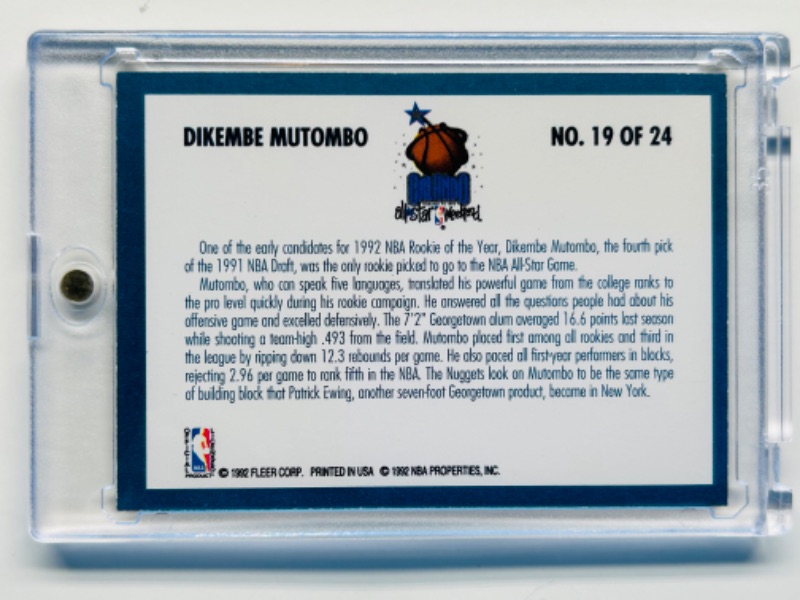 Photo 2 of 699006…Fleer Dikembe Mutombo Orlando card 19 in hard plastic case