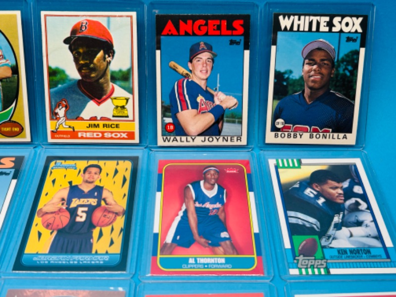 Photo 2 of 699008…15 sports Rookie cards in hard plastic sleeves 