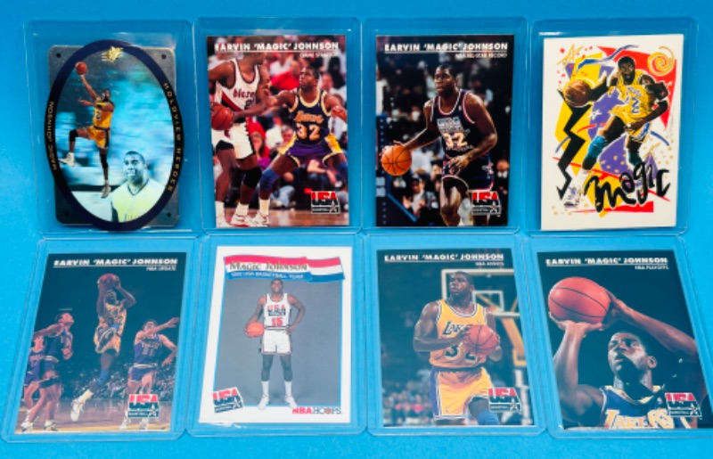 Photo 1 of 699019…8 Magic Johnson trading cards in  hard plastic sleeves