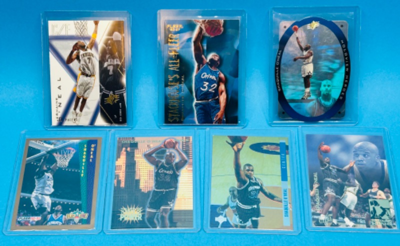 Photo 1 of 699021…7 Shaquille O’Neal trading cards in hard plastic sleeves