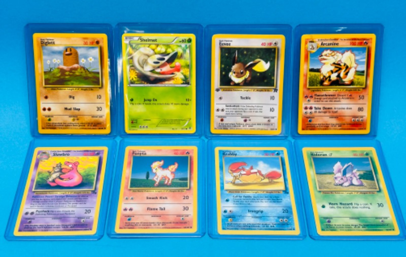 Photo 1 of 699109… 8 Pokémon trading cards in hard plastic sleeves 