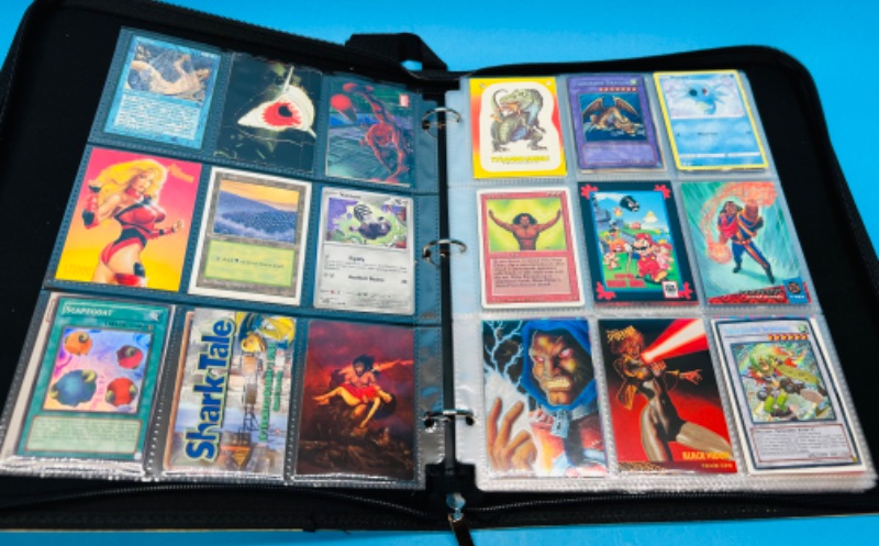 Photo 1 of 699116…final sales no returns no refunds-252 mixed character and game cards in binder