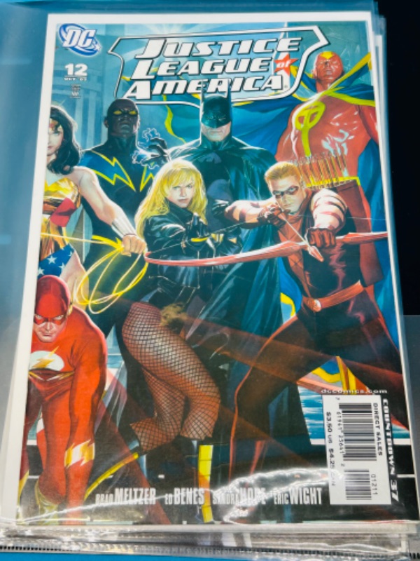 Photo 2 of 699120…10 justice league and society comics in binder-see photos 