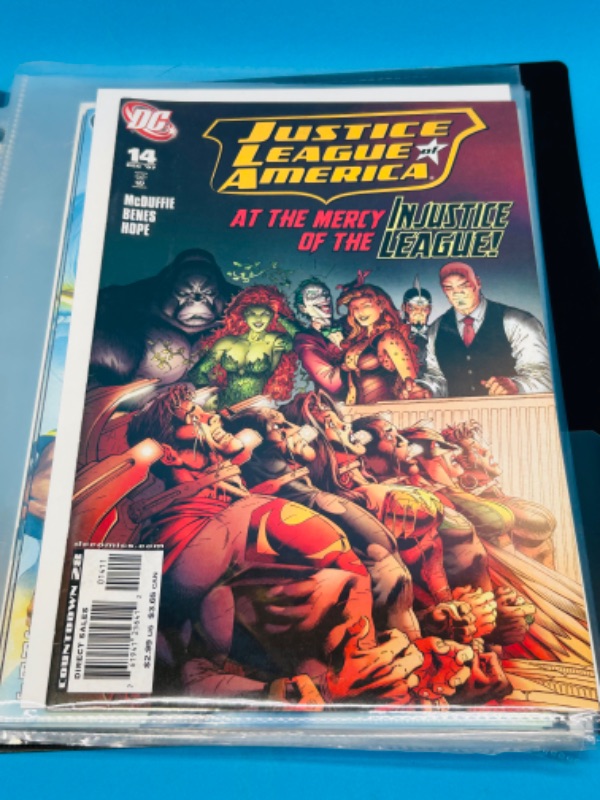 Photo 10 of 699120…10 justice league and society comics in binder-see photos 