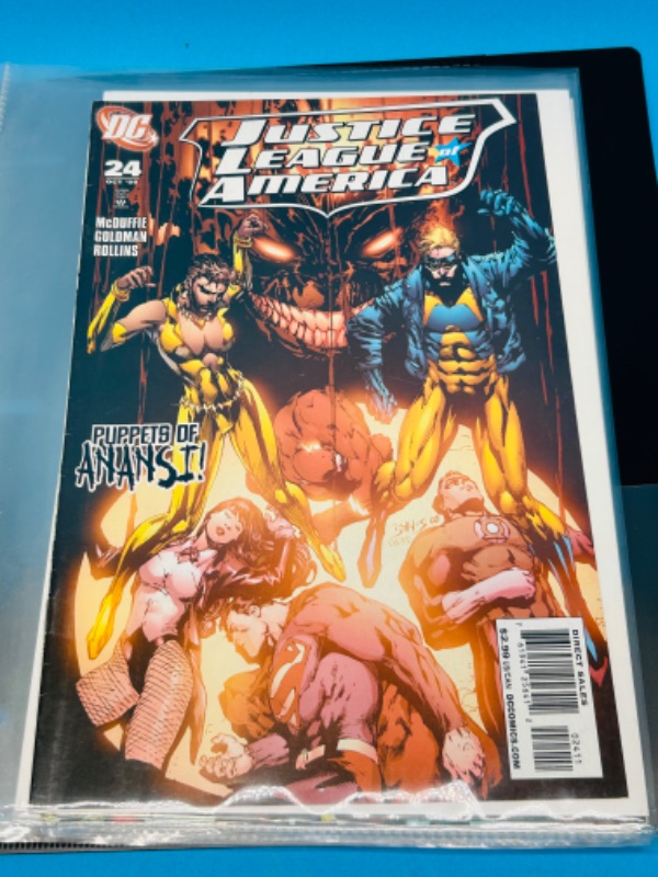 Photo 9 of 699120…10 justice league and society comics in binder-see photos 