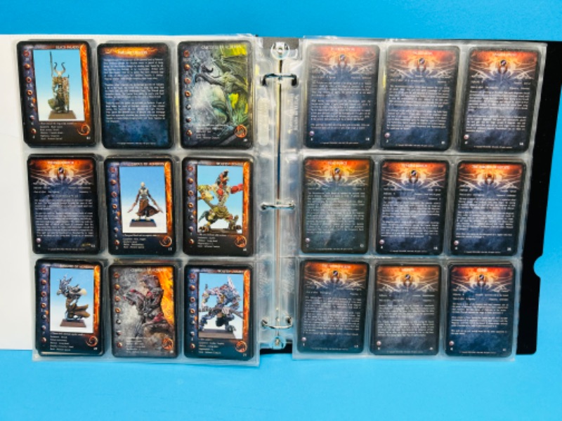 Photo 5 of 699122…80 Rackham Confrontation game cards in binder 