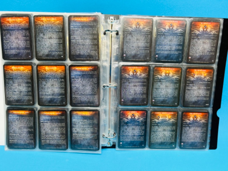 Photo 1 of 699122…80 Rackham Confrontation game cards in binder 