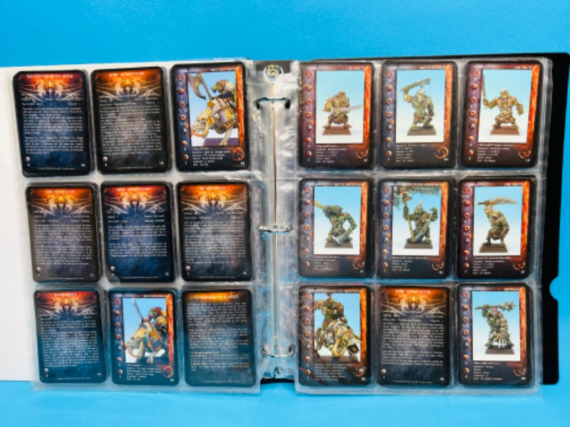 Photo 4 of 699123… 81 Rackham Confrontation game cards in binder 