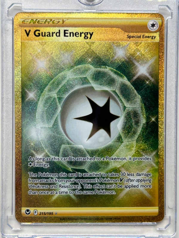 Photo 1 of 669137…Pokémon holofoil guard energy card 215/195 in  hard plastic case