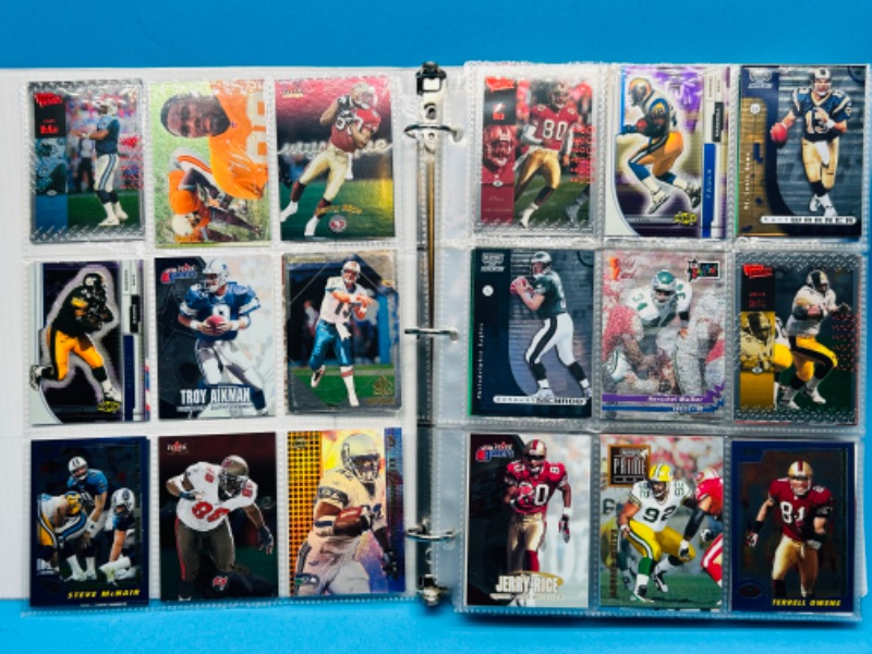 Photo 1 of 699148…252 mixed football refractor, chrome, foil and holo cards in binder