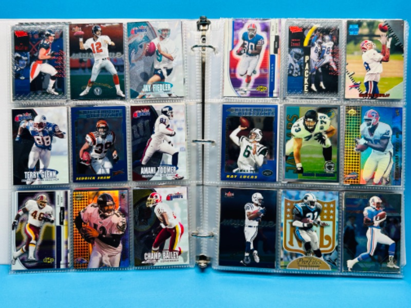 Photo 12 of 699148…252 mixed football refractor, chrome, foil and holo cards in binder