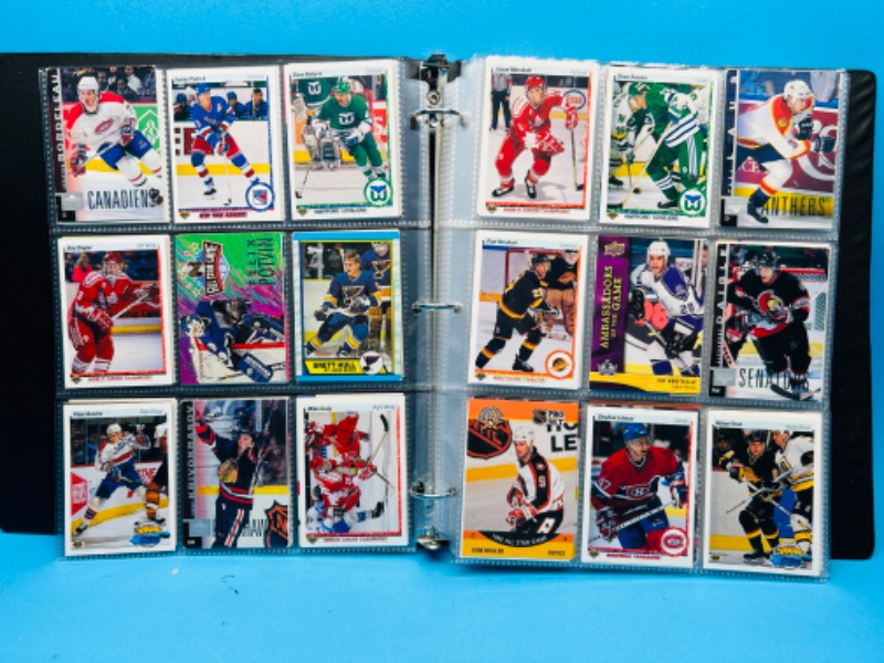 Photo 1 of 699153…270 mixed hockey cards in binder