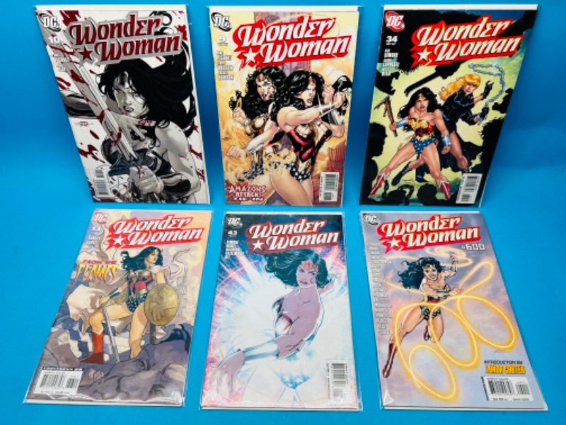 Photo 1 of 699160…6 Wonder Woman  comics in plastic sleeves 