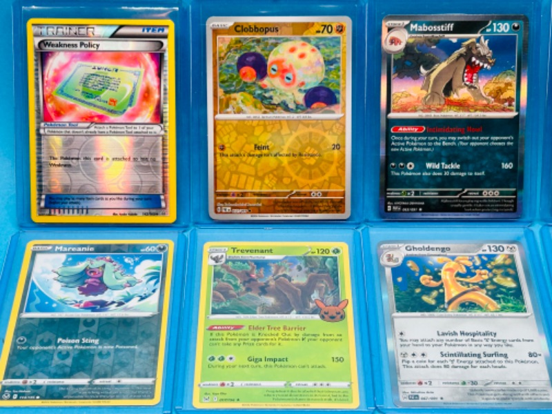 Photo 2 of 699172…10 Pokémon holo and reverse holo cards in hard plastic sleeves 