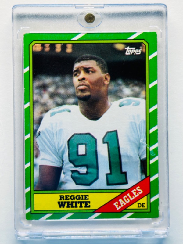 Photo 1 of 699177…Reggie White rookie card 275 in hard plastic case 