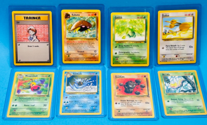 Photo 1 of 699201…8 Pokémon cards in hard plastic sleeves 