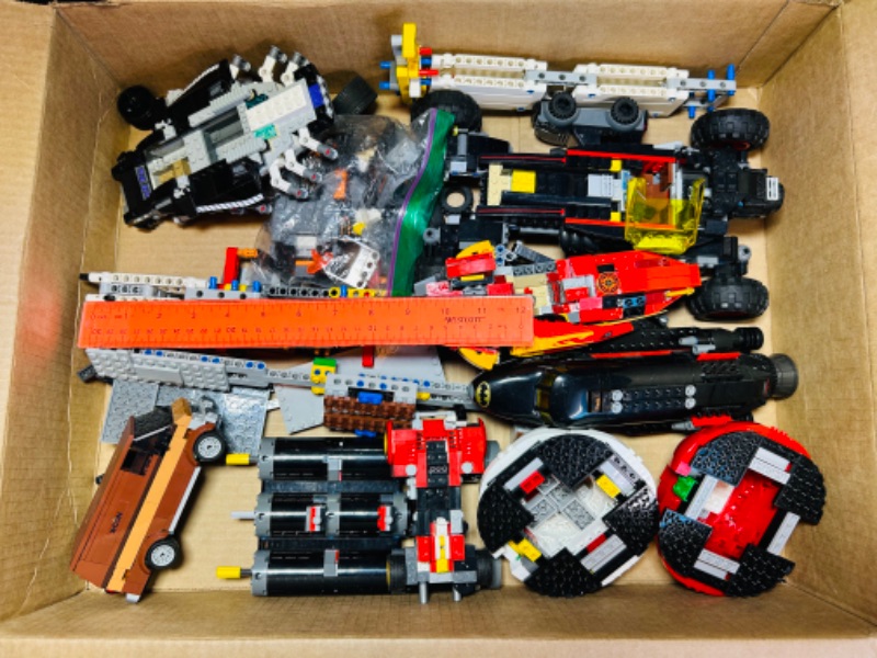 Photo 1 of 699209…misc LEGO pieces and vehicle parts- incomplete 