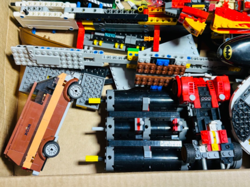 Photo 7 of 699209…misc LEGO pieces and vehicle parts- incomplete 