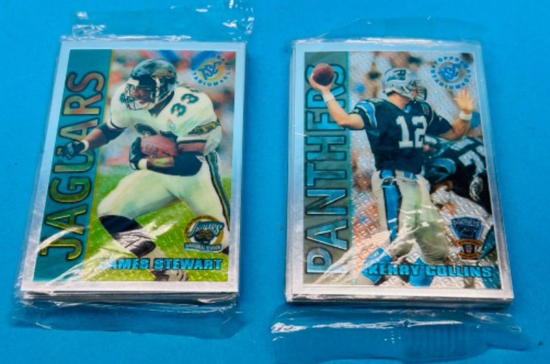 Photo 1 of 699220…2 sealed holo football packs