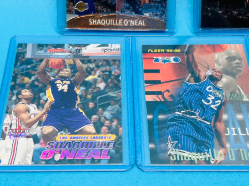 Photo 2 of 699227…5 Shaquille O’Neal trading cards in hard plastic sleeves