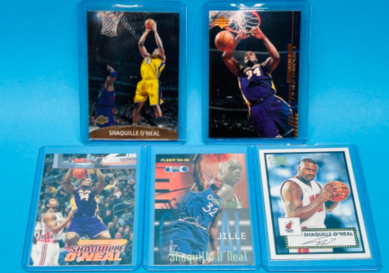 Photo 1 of 699227…5 Shaquille O’Neal trading cards in hard plastic sleeves