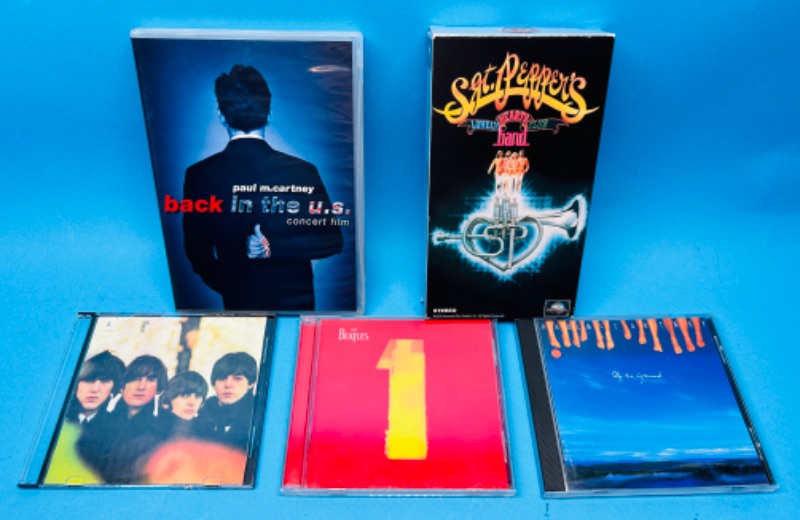 Photo 1 of 699401…Beatles music CD’s, disc, and VHS