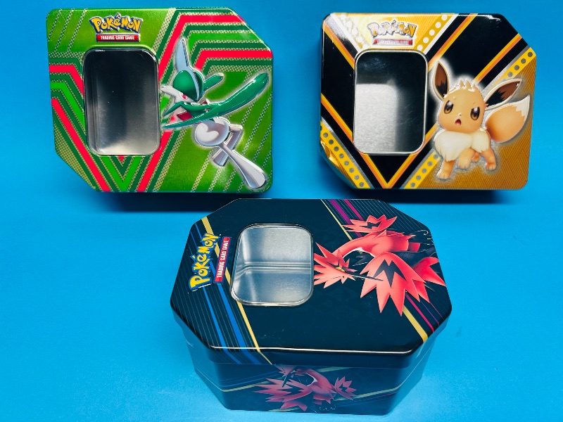 Photo 2 of 699438… 3 EMPTY Pokémon tins-empty