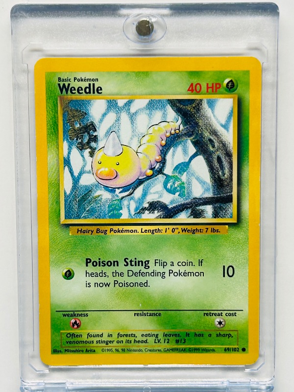 Photo 1 of 699454…Pokémon card 69/102  in hard plastic case