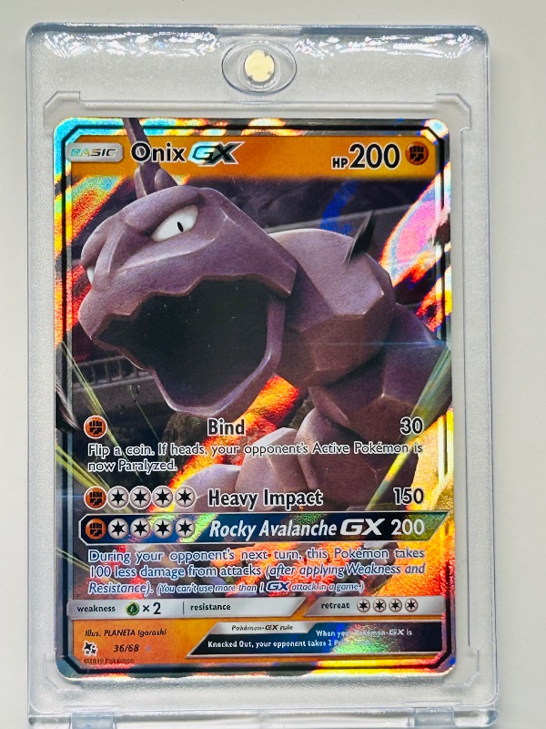 Photo 1 of 699461…Pokémon GX holo card 36/68  in hard plastic case