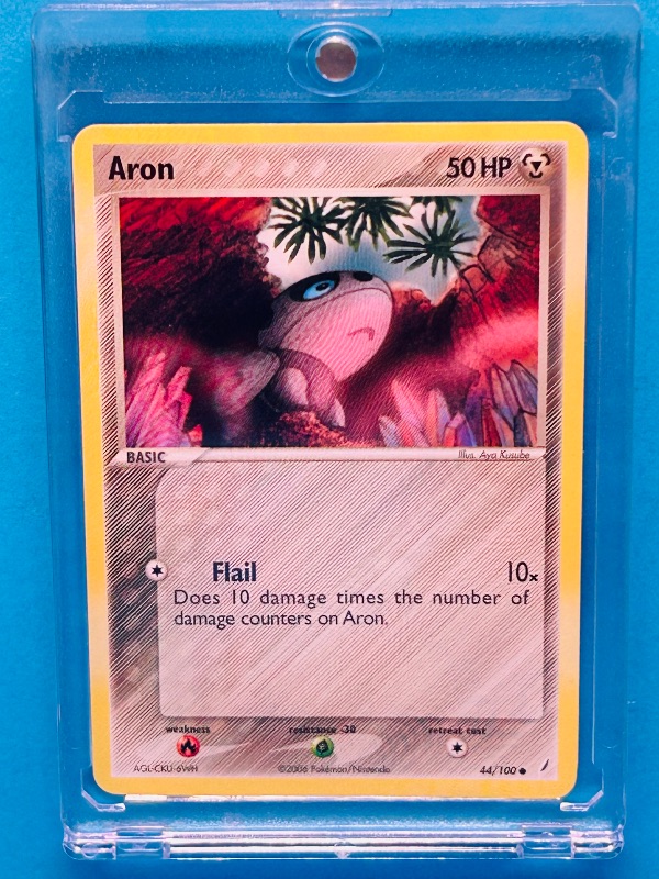 Photo 1 of 699462…Pokémon card44/100  in hard plastic case